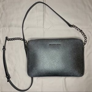 Michael Kors cross body purse gray.